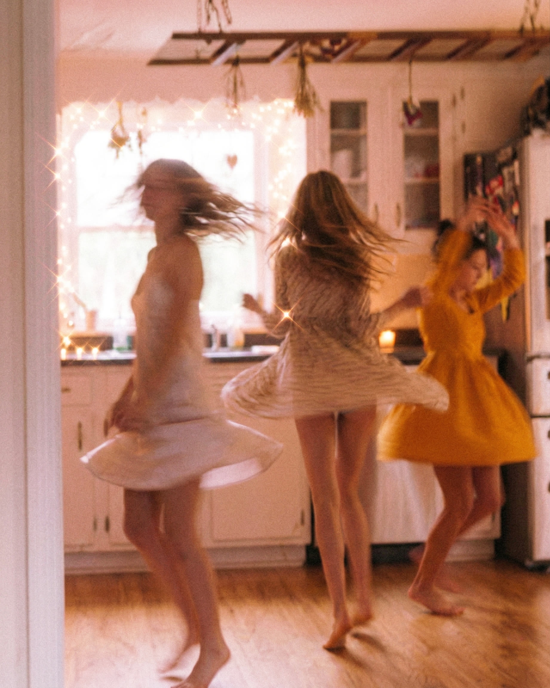 Dancing indoors in golden light